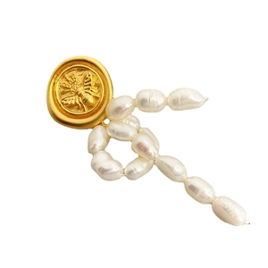 Golden bee relief disc brooch featuring white baroque pearls and elegant bow detail