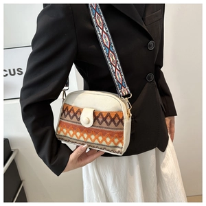 Sac bandoulière style ethnique en toile avec bandoulière tissée et motifs géométriques