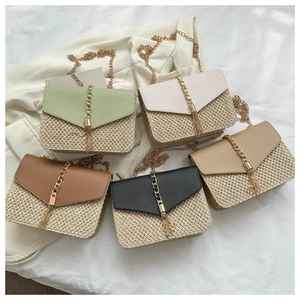 Straw woven crossbody bags with chain fringe in green, cream, brown, black, and khaki