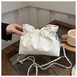 White ruched cloud bucket bag with silver chain strap and metallic sphere charm detail