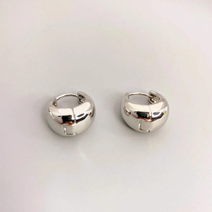 Minimalist silver wide hoop earrings with high-polish smooth surface and clasp