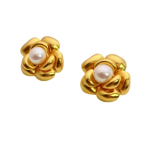 Elegant gold camellia flower stud earrings with white pearl center for a chic look
