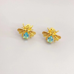 Fashionable bee stud earrings in gold with gradient blue-green rhinestones