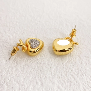 Minimalist gold heart stud earrings with sparkling crystals and polished finish