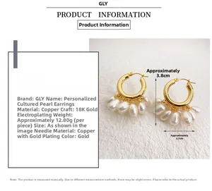 Detail view of 18K gold plated brass earrings featuring baroque pearls with size measurements