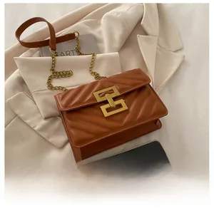 Caramel crossbody bag size comparison showing quilted PU leather and gold chain strap