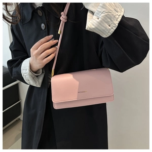 Pink minimalist crossbody bag in matte leather featuring gold MISSMINI lettering logo