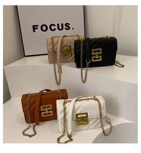 Quilted chain shoulder bags in beige, black, brown and white with gold metal locks