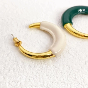 Fashionable gold-plated C-shape hoop earrings with cream white and green enamel glaze
