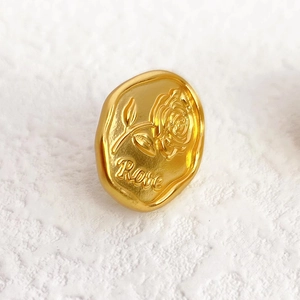French vintage matte gold earrings with embossed rose pattern and Rose lettering detail