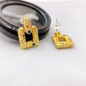 Chic gold-plated irregular lava texture earrings with colorful faceted gemstones