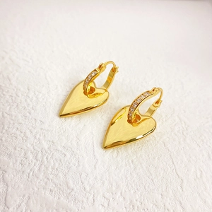 Polished 18K gold plated brass heart hoop earrings with sparkling white zircons