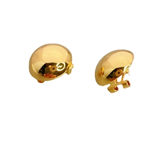 Polished gold dome stud earrings with round minimalist semi-sphere metallic design