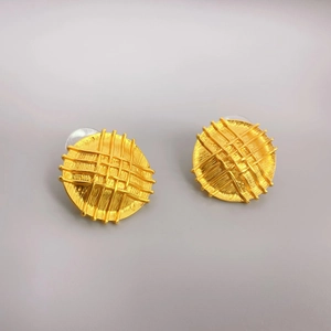 Elegant gold round stud earrings featuring an intricate quilted texture and 18K gold plating