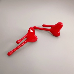 Elegant red enamel heart earrings with unique liquid melting drop design for women