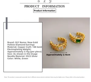 Detailed view of C-shaped gold earrings with square-cut white and green stones