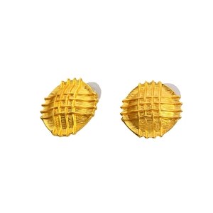 Classic 18K gold plated brass stud earrings featuring a textured round quilted design