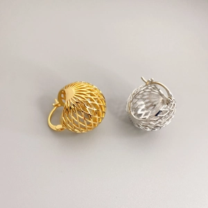 Hollow lattice sphere earrings in gold and silver finish with cross mesh design