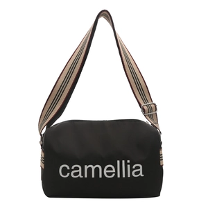 Black nylon pillow bag with white camellia print and vintage plaid adjustable strap