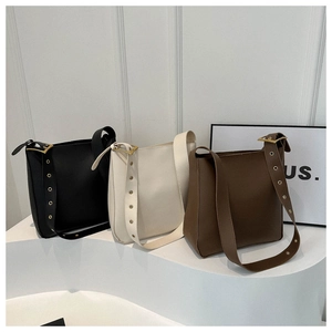 Minimalist PU leather crossbody bucket bags in black, beige and brown colors
