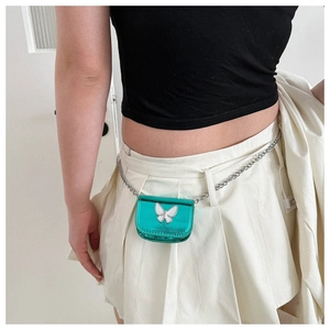 Metallic green mini belt bag with white butterfly detail and silver chain strap