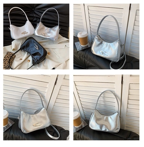 Collage of chic crescent underarm bags in black, white, and silver with metal logo detail