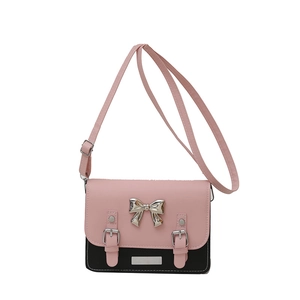 Pink and black bow-accented square crossbody bag with silver metallic hardware for women