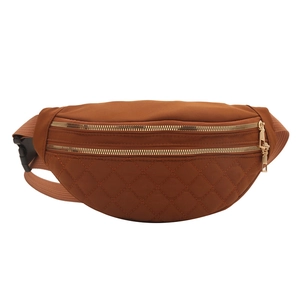 Caramel brown quilted nylon saddle bag with double gold zippers and adjustable strap