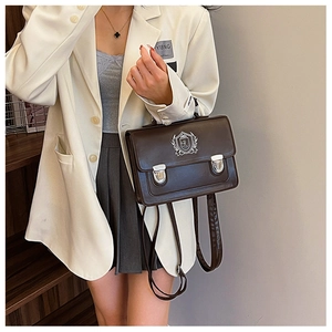 British style brown leather satchel with shield badge, versatile shoulder and handbag