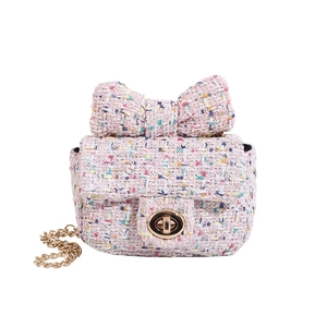 Pink tweed crossbody bag for girls with decorative bow and golden chain strap