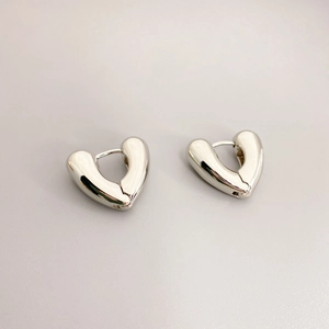 Minimalist silver S925 sterling silver heart hoop earrings with sleek metallic finish