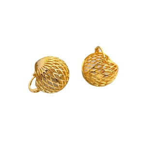 Chic gold-hued hollow sphere earrings with elegant lattice texture on white backdrop