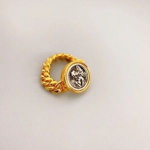Vintage gold rope chain ring with silver coin relief depicting a classical figure