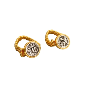 Vintage gold twist chain ring with silver coin relief featuring Greek style embossed portrait
