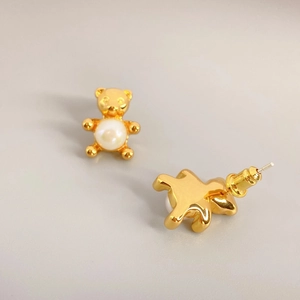 Cute golden bear stud earrings with white pearl inlay for a stylish minimalist look