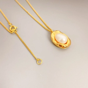 French style 18K gold-plated necklace with a natural freshwater pearl and bean pendant