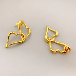 Elegant 18K gold plated heart earrings featuring a minimalist hollow intertwined design