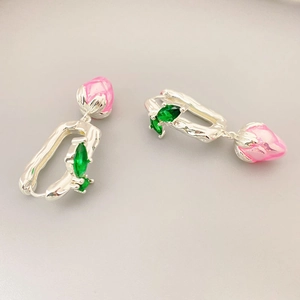 Silver flower bud earrings with pink enamel petal pendant and green leaf stones