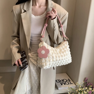 White popcorn textured cloud bag with pink rope handles and floral charm for women