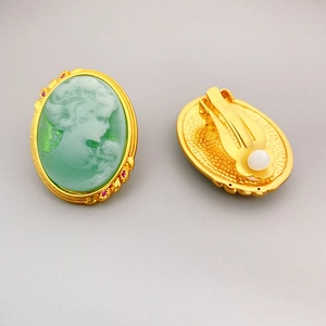 Vintage green cameo portrait clip-on earrings with gold-plated frame and red stones