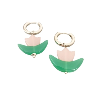 Pink tulip drop earrings with green leaves and silver hooks on a white background