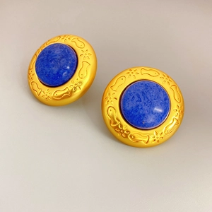 Vintage matte gold round stud earrings with deep blue gemstone and sea life engravings