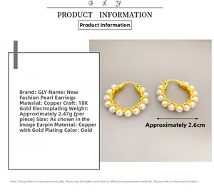 Detailed view of elegant pearl hoop earrings with 18K gold plating and 2.6cm diameter