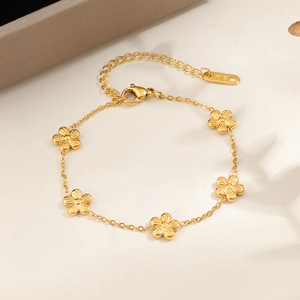 Elegant 18K gold plated stainless steel bracelet with five delicate flower charms