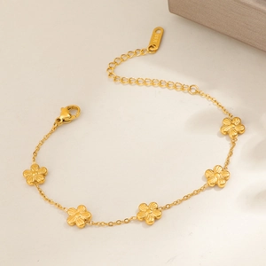 Elegant 18K gold plated flower bracelet featuring five petal charms and lobster clasp