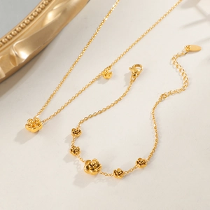 Golden camellia flower necklace and bracelet jewelry set in durable titanium steel