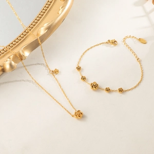 3D camellia jewelry set with gold necklace and bracelet featuring rose flower charms