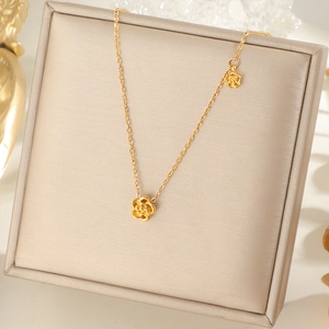 3D camellia pendant necklace in gold finish with delicate layered petals on double charms