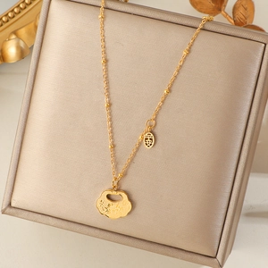 Vintage gold-plated titanium steel longevity lock necklace with lotus patterns