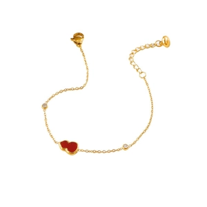 Elegant gold bracelet featuring a red gourd pendant and sparkling zircon accents